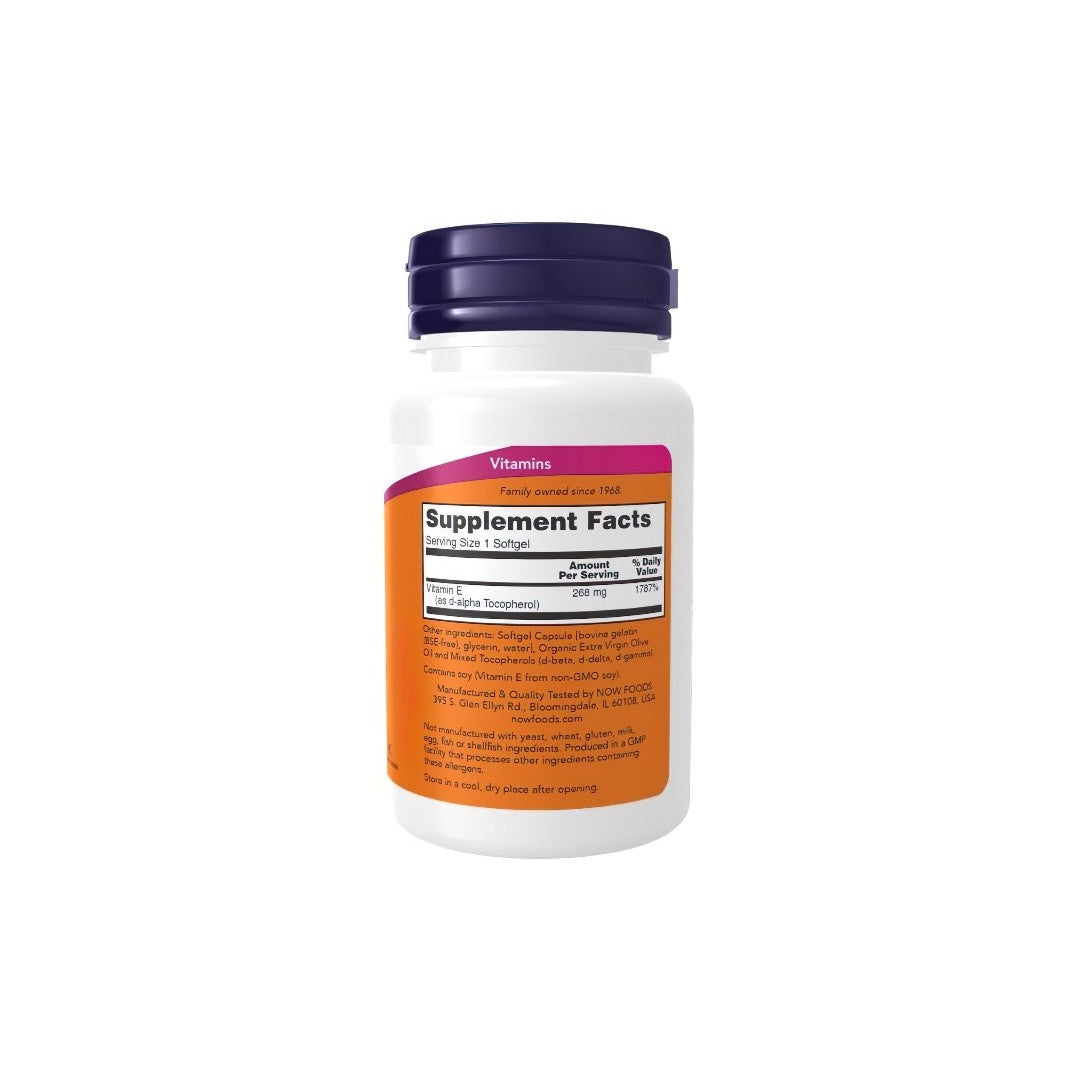 A bottle of Now Foods Vitamin E-400 With Mixed Tocopherols 100 Softgels with a nutrition facts label, promoting heart health with its antioxidant effects.