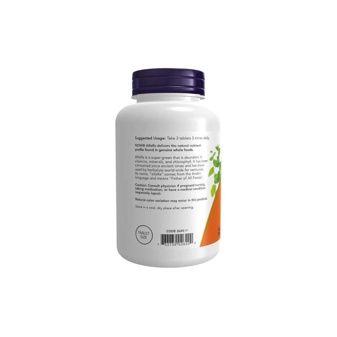 A white bottle of Now Foods Alfalfa 650 mg 250 Tablets with a dark blue lid is shown from behind, displaying text that lists suggested usage and other product information for an alfalfa supplement designed to support heart health.