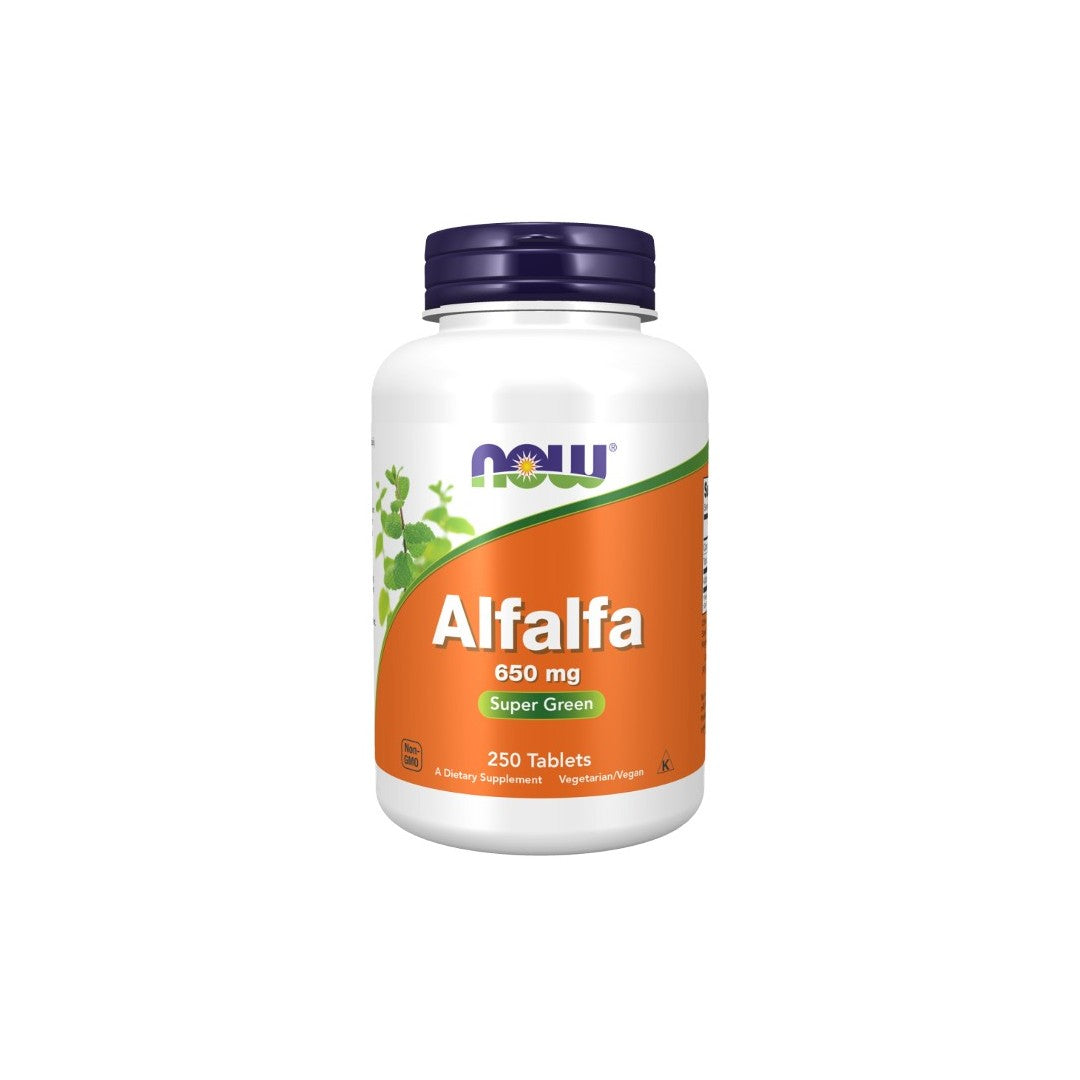 A white bottle of Now Foods Alfalfa 650 mg dietary supplement, containing 250 tablets. The label is orange and green with the text "Super Green" and an image of alfalfa leaves, highlighting its vitamins and minerals for heart health.