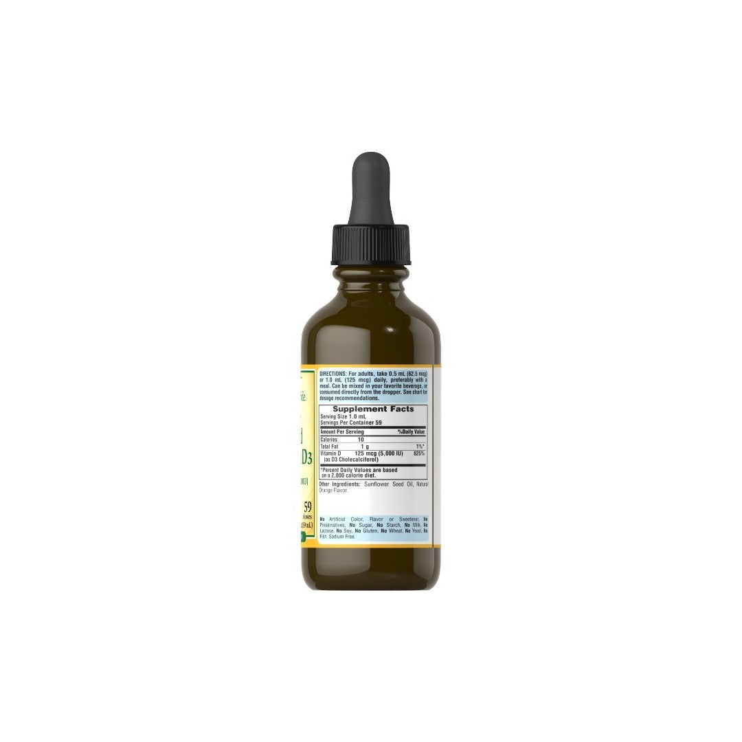 A bottle of Puritan's Pride Liquid Vitamin D3 125 mcg (5000 IU) supplement with a dropper and a detailed label focused on immune system and bone health.