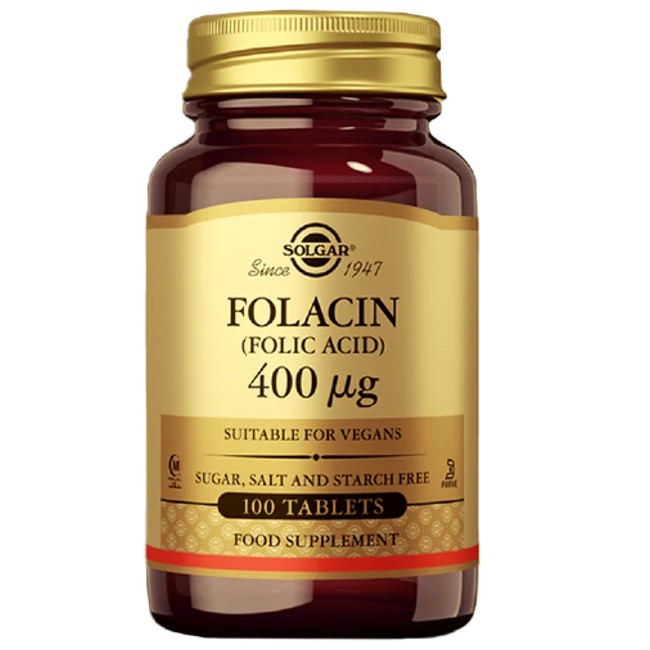 A jar of Solgar Folacin (Folic Acid) 400 mcg tablets, labeled as vegan, sugar, salt, and starch-free, supporting prenatal health and containing 100 tablets.