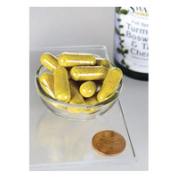 Thumbnail for A small glass bowl contains yellow capsules next to a penny for scale, with a Swanson bottle labeled 