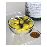 Thumbnail for A small glass bowl with yellow capsules, promoting cardiovascular health, sits next to a penny for scale. In the background, a blurred bottle is labeled 