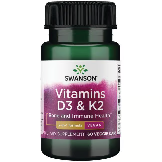 A green bottle of Swanson Vitamins D3 2000 IU & K2 75 mcg, with a purple and white label, supports bone health and immunity. This formula provides 60 vegan veggie capsules for essential vitality.