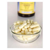 Thumbnail for A small glass bowl holding white capsules, likely Swanson's P-5-P 40 mg double strength for cardiovascular support, is in focus while a blurred bottle remains in the background.