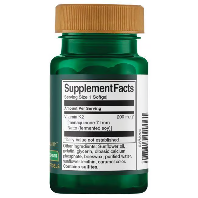 The Swanson Real Food Vitamin K2 200 mcg 30 Softgels come in a green bottle with a white label detailing supplement facts and ingredients like sunflower oil and glycerin, featuring 200 mcg of menaquinone-7 from natto per serving.