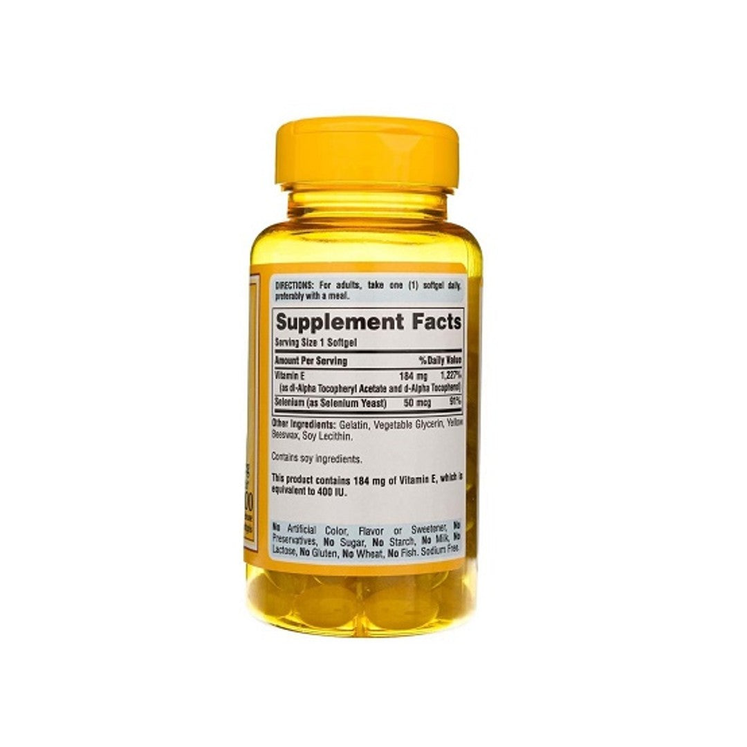 A bottle of Puritan's Pride Vitamin E (d-Alpha Tocopherol) 400 IU & Selenium 50 mcg 100 Rapid Release Softgels, a powerful antioxidant support, on a white background.