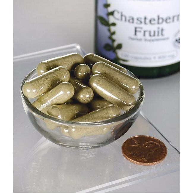 SwansonChasteberry Fruit - 400 mg 120 Kapseln in einer Schale auf einem Pfennig.