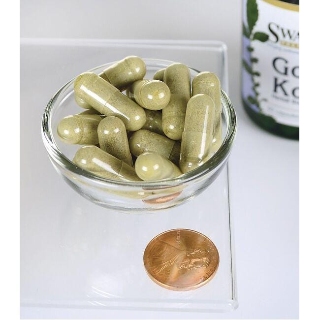 Swanson Gotu kola - 435 mg 60 Kapseln in einer Schale neben einem Pfennig.