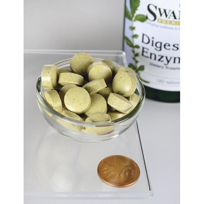 Eine Flasche Swanson Verdauungsenzyme - 180 Tabletten und ein Penny in einer Glasschale.
