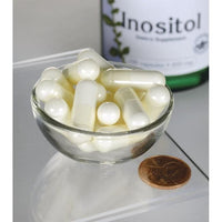 Vorschaubild für Swanson Inositol - 650 mg 100 Kapseln in einer Schale neben einer Flasche Swanson Inositol.