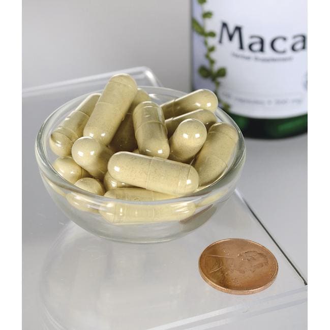 Swanson Maca - 500 mg 100 Kapseln in einer Schale neben einer Flasche Swanson Maca.