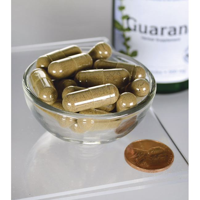 Swanson Guarana - 500 mg 100 Kapseln in einer Schale neben einer Flasche.