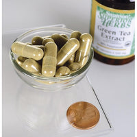 Vorschaubild für Swanson's Green Tea Extract - 500 mg 60 Kapseln neben einem Pfennig.