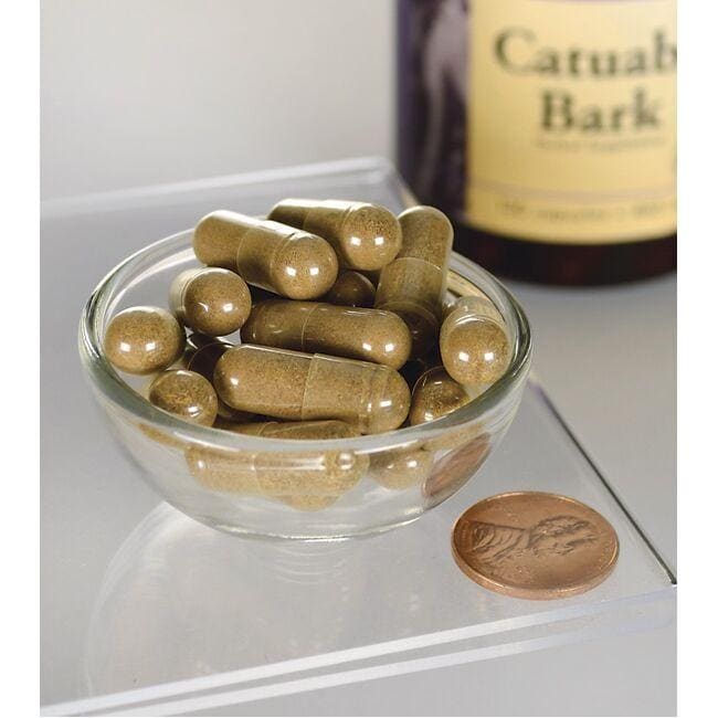 Swanson Catuaba Bark - 465 mg 120 Kapseln in einer Schale neben einer Flasche.