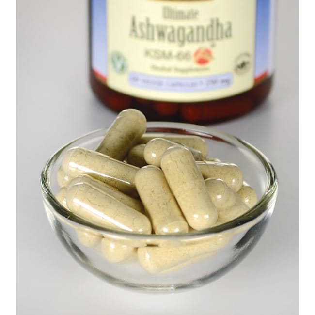 Swanson Ashwagandha - KSM-66 - 250 mg 60 pflanzliche Kapseln in einer Schale neben einer Flasche.
