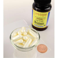 Vorschaubild für Eine Flasche Swanson Melatonin - 10 mg 60 Kapseln und eine Schale Swanson Melatonin - 10 mg 60 Kapseln.