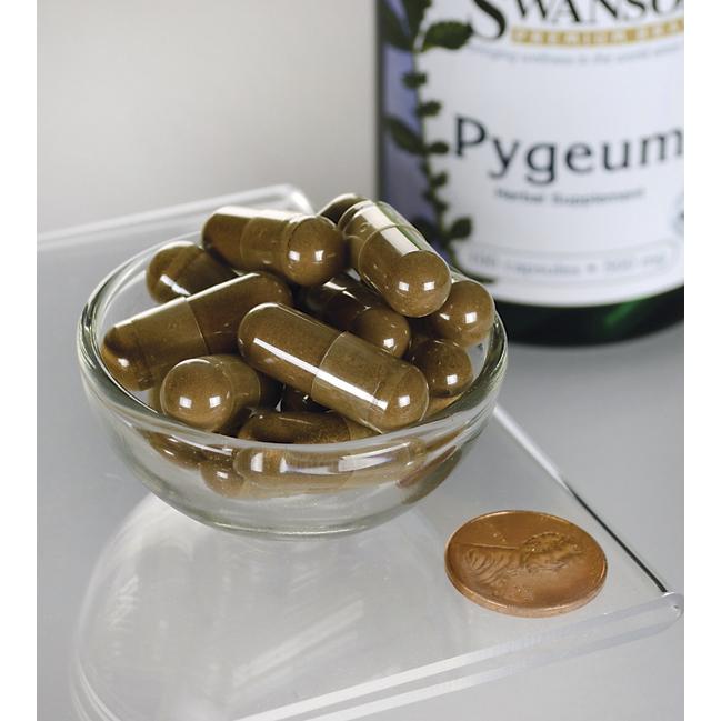 Swanson Pygeum - 500 mg 100 Kapseln in einer Schale neben einer Flasche Swanson Pygeum für die Gesundheit der Prostata.