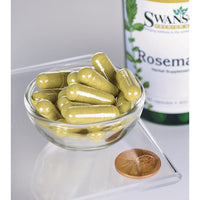 Daumennagel für Eine Schale mit einer Flasche Swanson Rosmarin - 400 mg 90 Kapseln, ein antioxidantienreiches Kraut, und einem Penny.
